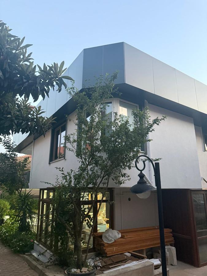 Habillage de façade en panneaux à Mantes-la-Jolie